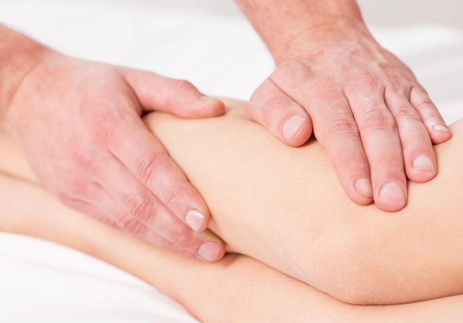 Close-up of young woman having reflexology