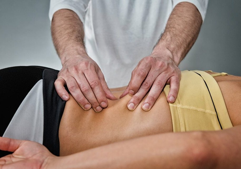 Close-up of young woman having reflexology