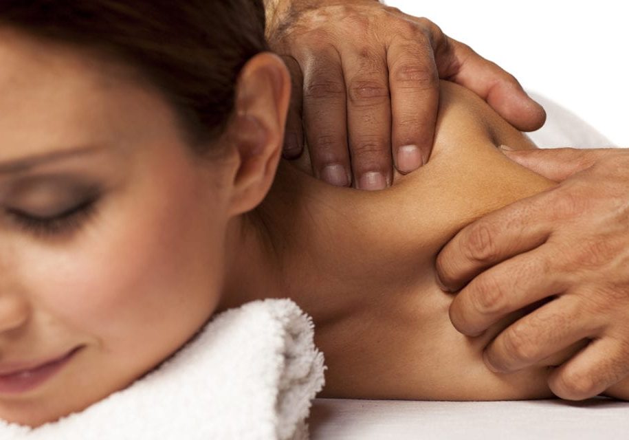 Close-up of young woman having reflexology